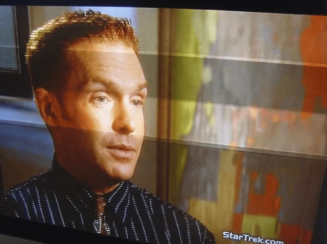 Restored image with original stripes revealed